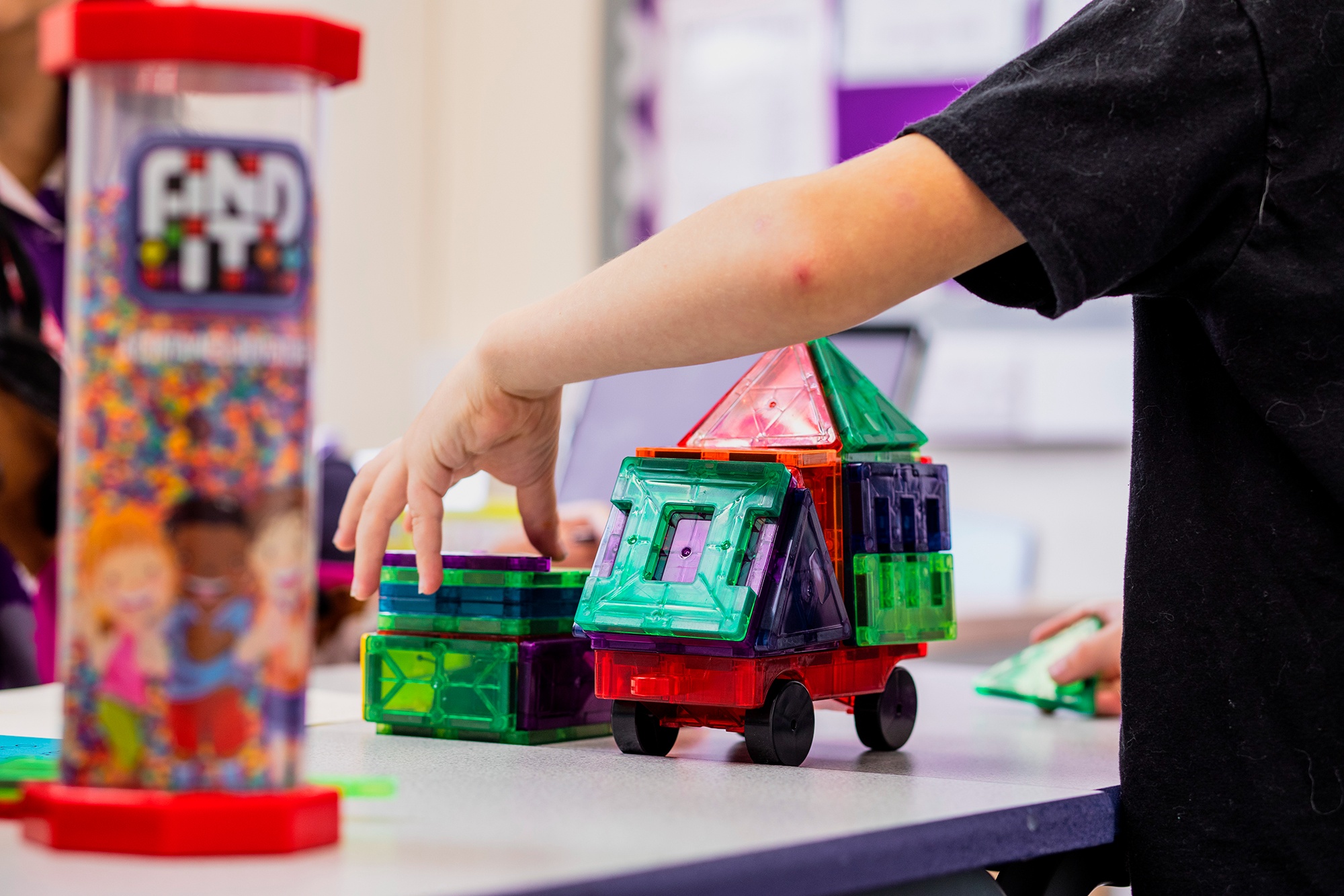 Image of child playing with toys